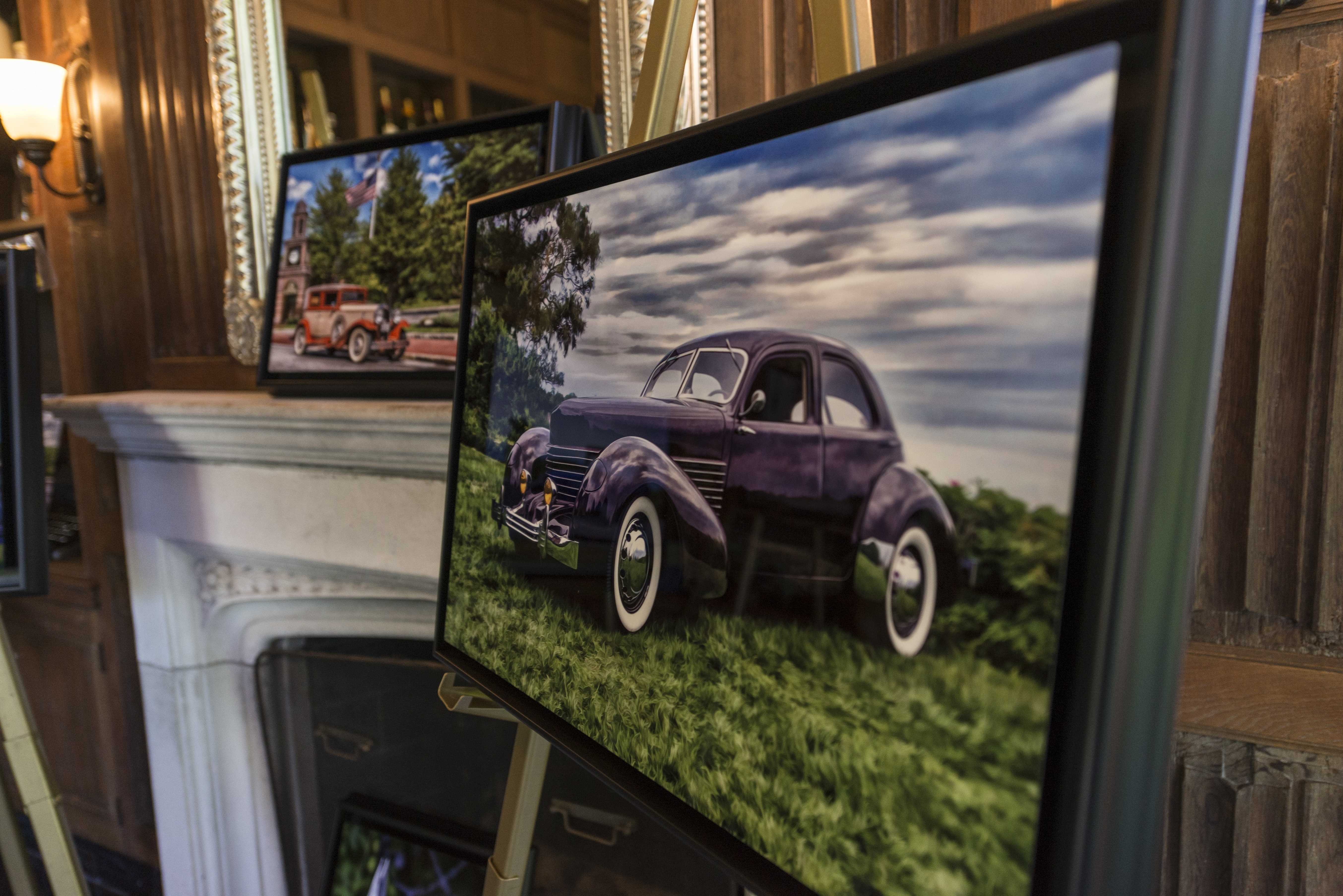 A portrait of a Concours car on display in the Misselwood library