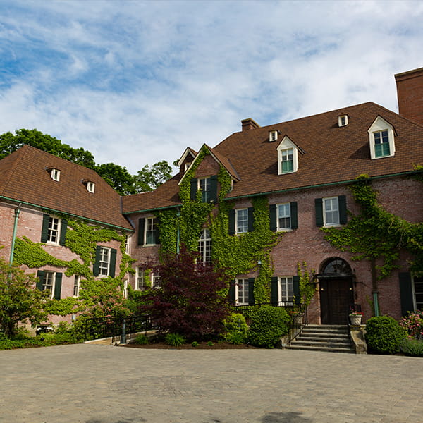 angled photograph of brick house on misselwood property