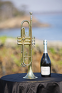 Trumpet on a table with the ocean in the background