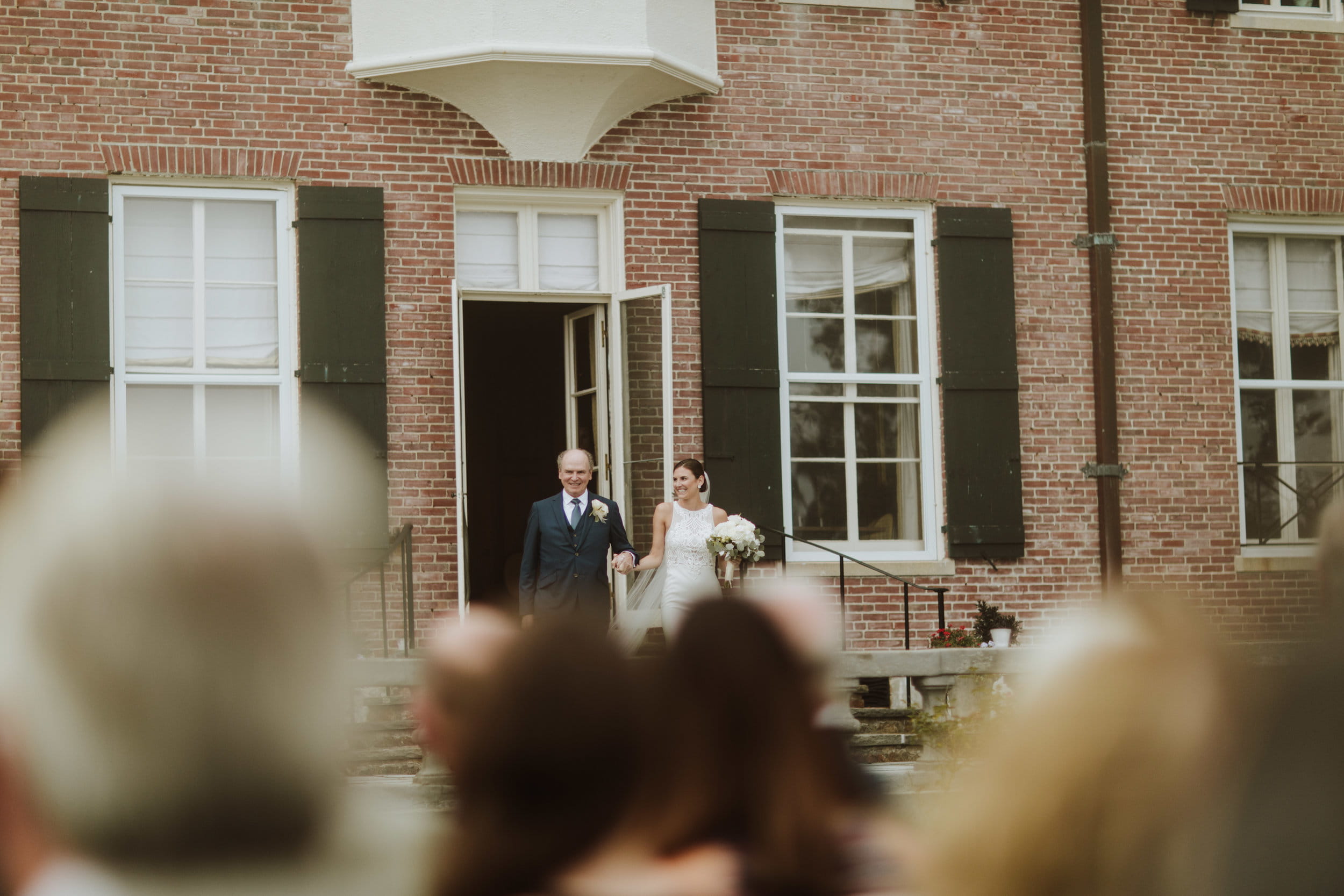 Misselwood Wedding Photo Bride and Groom leaving through front door at Misselwood