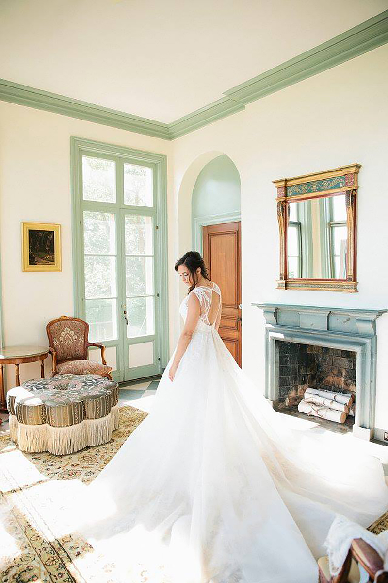 Bride in Wedding gown in Misselwood Ocean Room